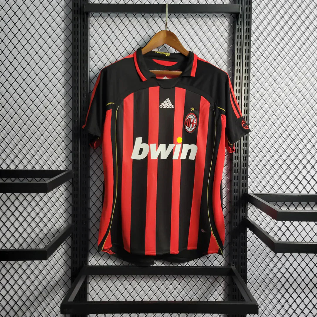 https://cdn.shopify.com/s/files/1/0911/7686/1985/files/ACMILAN2006_07HOMESHIRT1_8e6725bf-226d-4295-8985-f0e72978846f.webp?v=1731947296