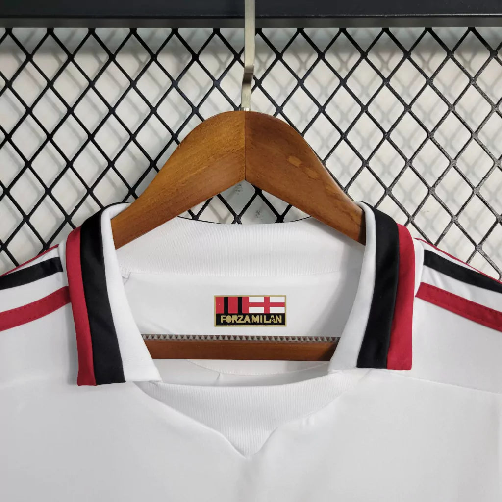 https://cdn.shopify.com/s/files/1/0911/7686/1985/files/ACMILAN2009_10AWAYSHIRT2.webp?v=1731947162