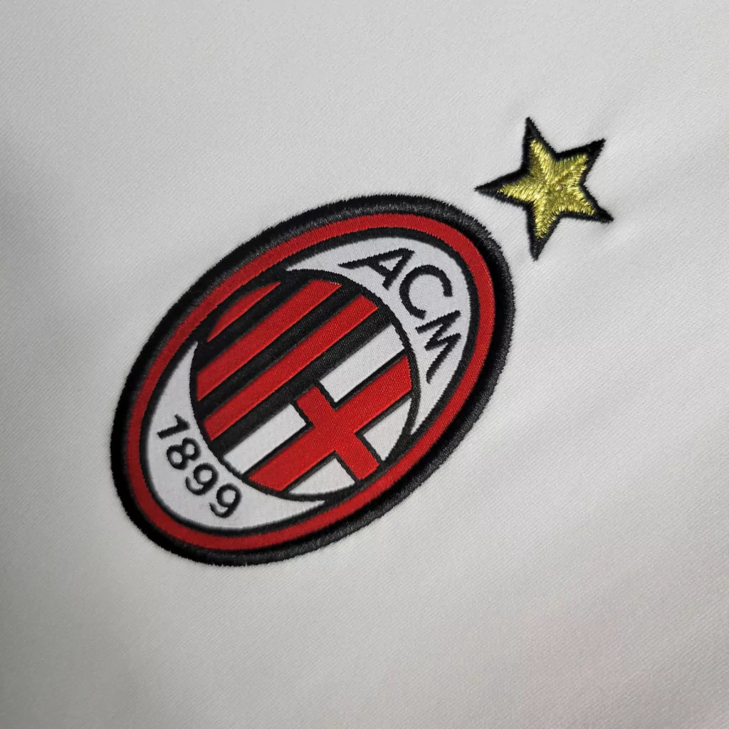 https://cdn.shopify.com/s/files/1/0911/7686/1985/files/ACMILAN2009_10AWAYSHIRT3.webp?v=1731947162