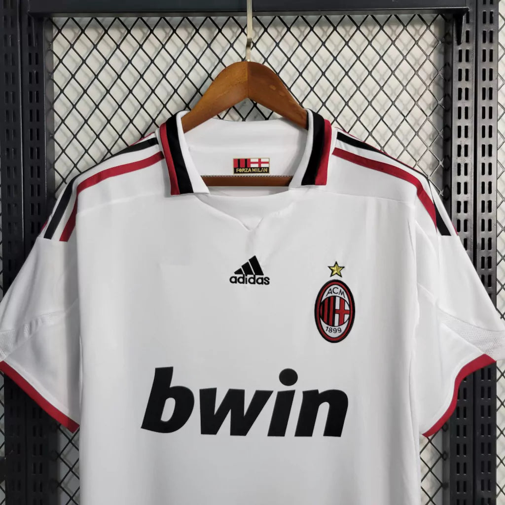 https://cdn.shopify.com/s/files/1/0911/7686/1985/files/ACMILAN2009_10AWAYSHIRT4.webp?v=1731947162