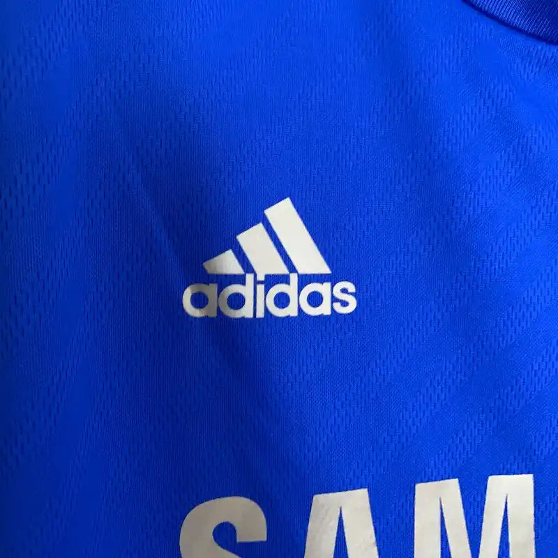 https://cdn.shopify.com/s/files/1/0911/7686/1985/files/Retro-2012-13-Chelsea-Long-Sleeved-Soccer-Jersey-Home-4.webp?v=1759595120
